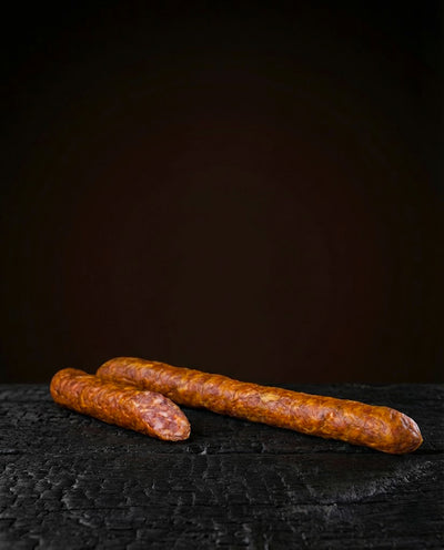 Cârnați de porc dublu afumați tradiție dacică — culoare maro-roșcată profundă, vidați, 500g
